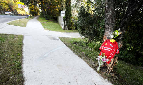 Flowers and a Red Devils Rugby League Club guernsey mark the site where 20-year-old Ben Donohoe lost his life in a car accident on the Bangalow Road at Byron Bay early yesterday morning. Flowers and a Red Devils Rugby League Club guernsey mark the site where 20-year-old Ben Donohoe lost his life in a car accident on the Bangalow Road at Byron Bay early yesterday morning.
